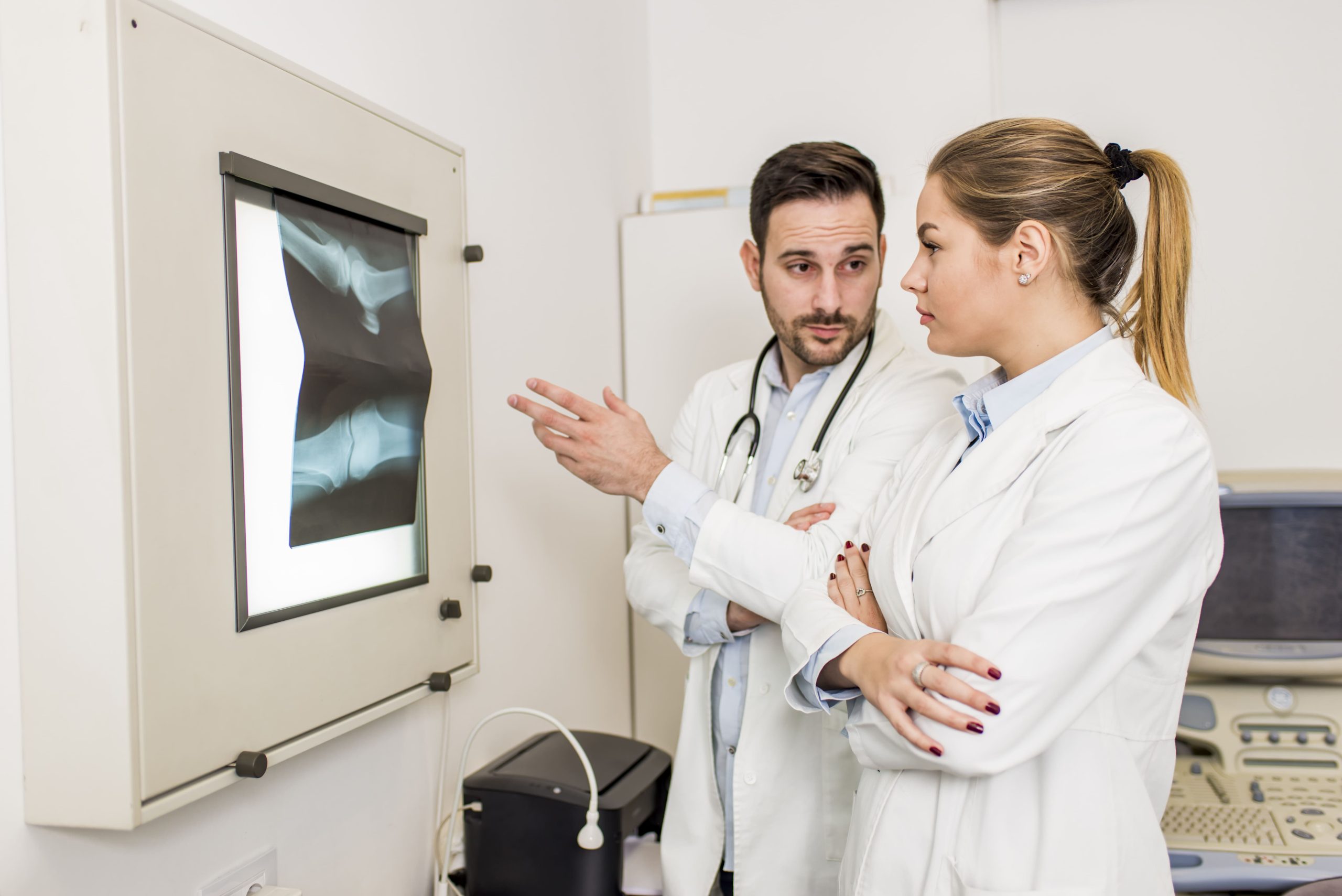 Doctors Examining X Ray Patient Clinic 1 Scaled